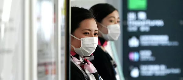 Девушки в медицинских масках. Архивное фото - Sputnik Кыргызстан