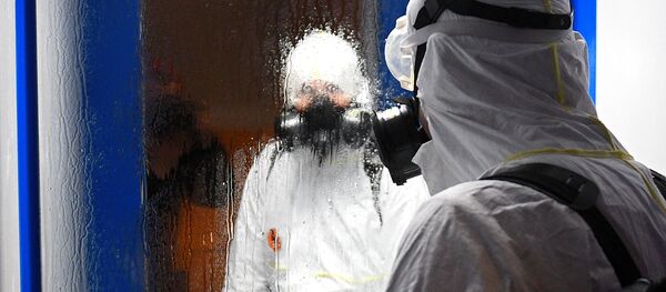 Дезинфекционная обработка в жилом доме в рамках профилактики коронавируса. Архивное фото - Sputnik Кыргызстан