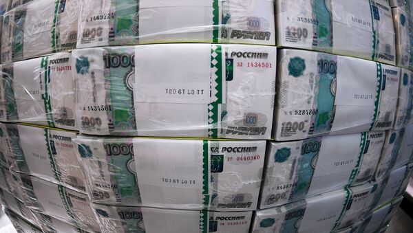 Пачки с рублевыми банкнотами. Архивное фото - Sputnik Кыргызстан