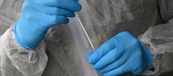 Сбор биоматериала для анализа на коронавирус. Архивное фото - Sputnik Кыргызстан