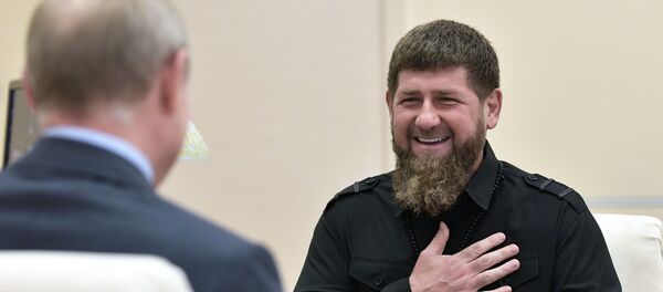 Глава Чеченской Республики Рамзан Кадыров во время встречи с президентом РФ Владимиром Путиным. Архивное фото - Sputnik Кыргызстан