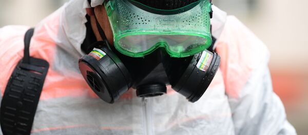 Дезинфекциялоо бригаданын кызматкери. Архив - Sputnik Кыргызстан