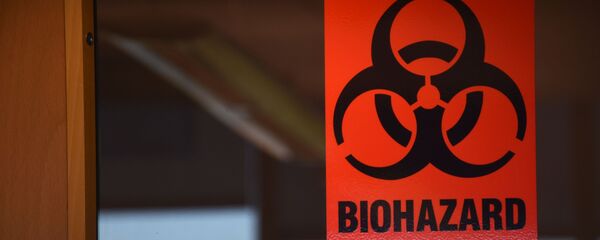 Предупреждающая табличка на двери лаборатории. Архивное фото - Sputnik Кыргызстан