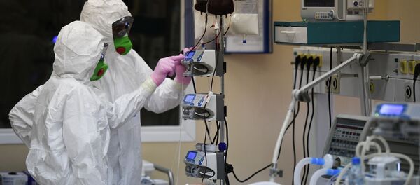 Бейтапты карап жаткан дарыгерлер - Sputnik Кыргызстан