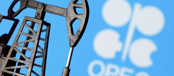 ОПЕК логотиби жана оюнчук мунай казуучу станция. Архив - Sputnik Кыргызстан