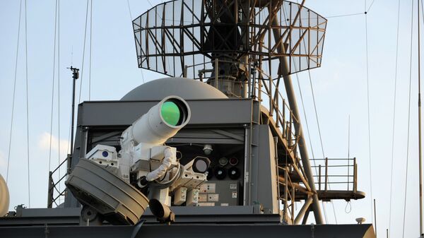 ВМС США проводят оперативную демонстрацию системы лазерного оружия. Архивное фото - Sputnik Кыргызстан