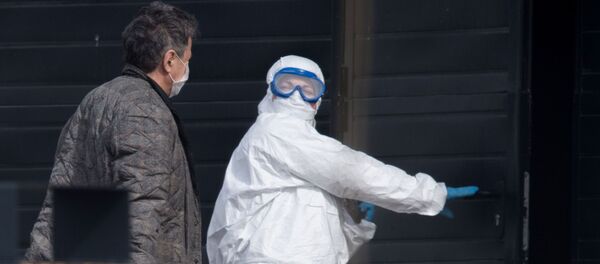 Больница в Коммунарке продолжает принимать пациентов с подозрением на коронавирус - Sputnik Кыргызстан