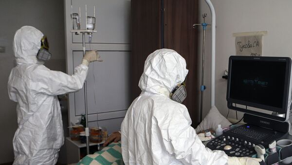 Оорукананын медицина кызматкерлери коронавирустук инфекцияны жуктуруп алгандар үчүн. Архив - Sputnik Кыргызстан