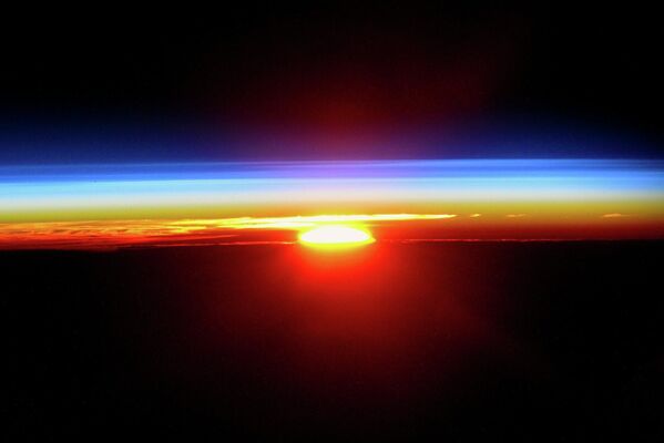 Закат солнца с борта Международной космической станции - Sputnik Кыргызстан