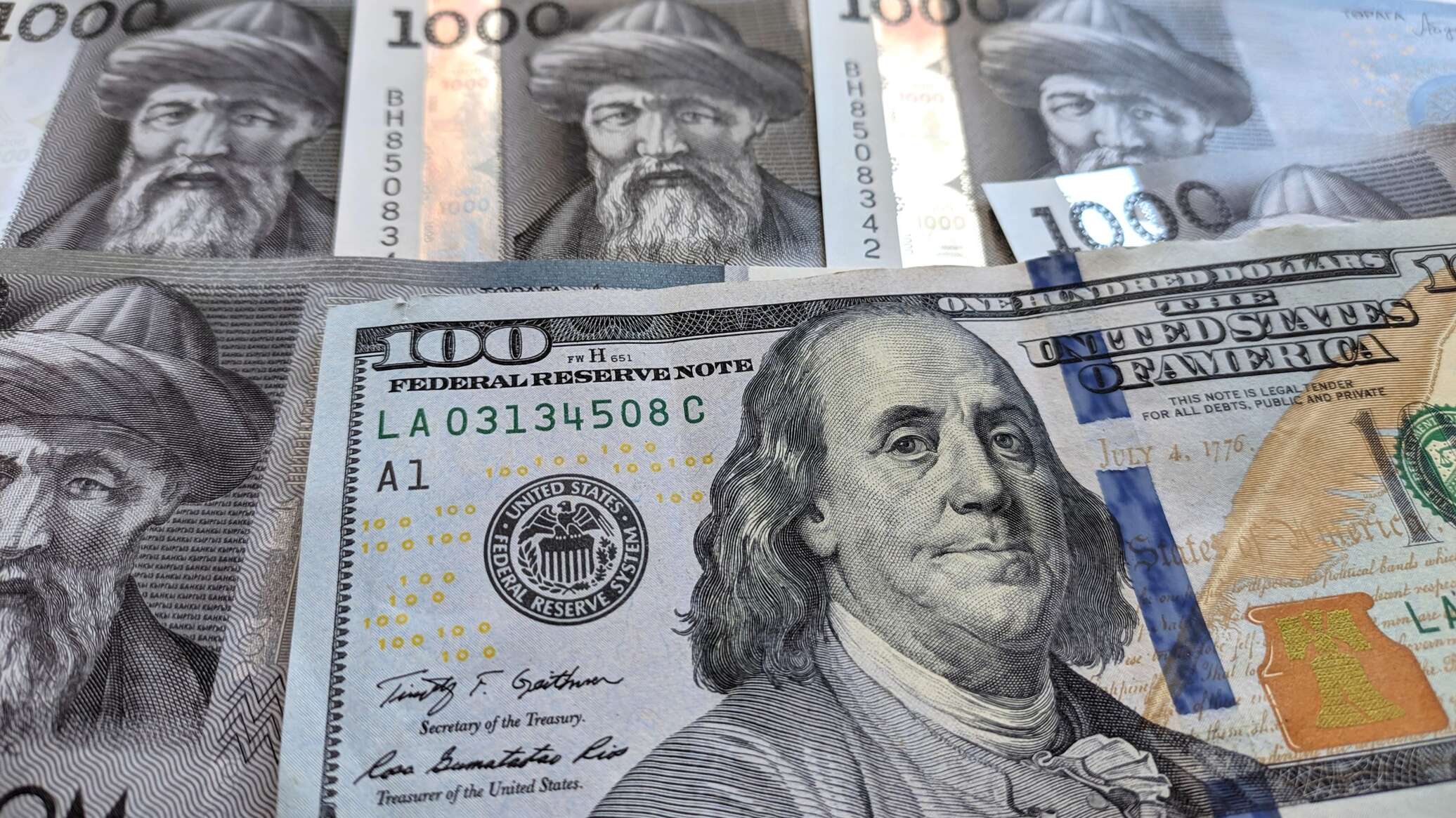 15 долларов в сомах