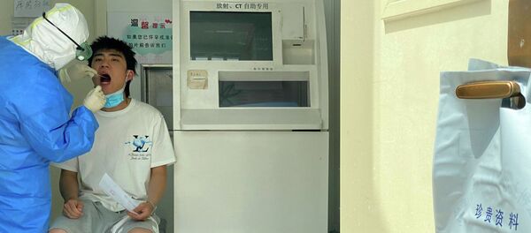 Шаар тургуну Пекиндеги клиникада текшерүүдөн өтүүдө. Архив - Sputnik Кыргызстан