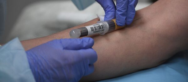 Тестирование на наличие антител к COVID-19. Архивное фото - Sputnik Кыргызстан